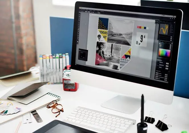 Graphic design workstation preparing artwork for print